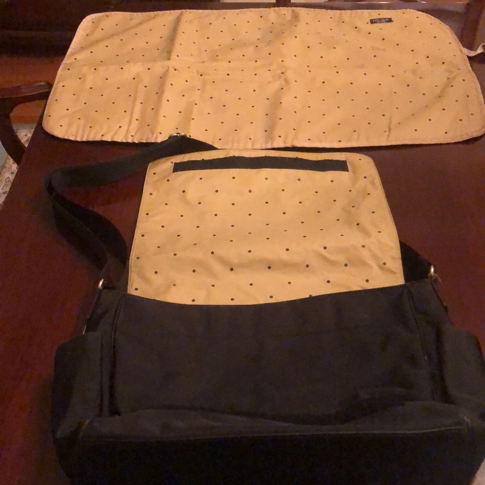 Kate Spade Diaper bag with changing pad.